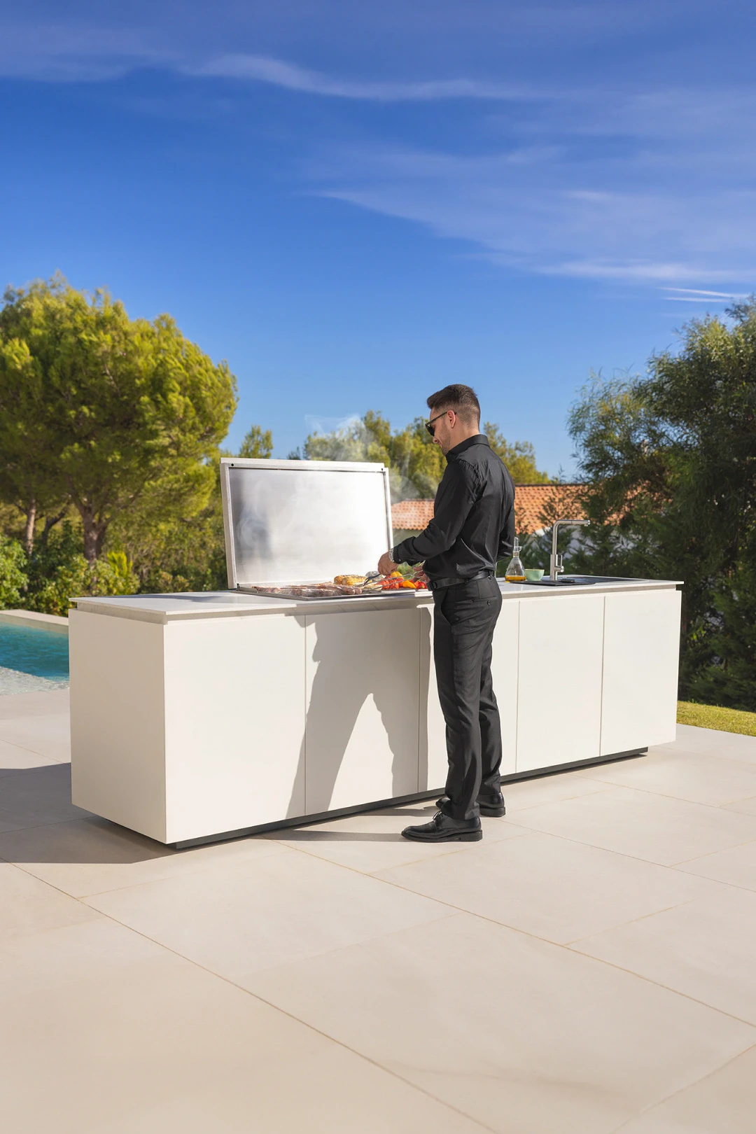 Why not go for a built-in outdoor kitchen? 1
