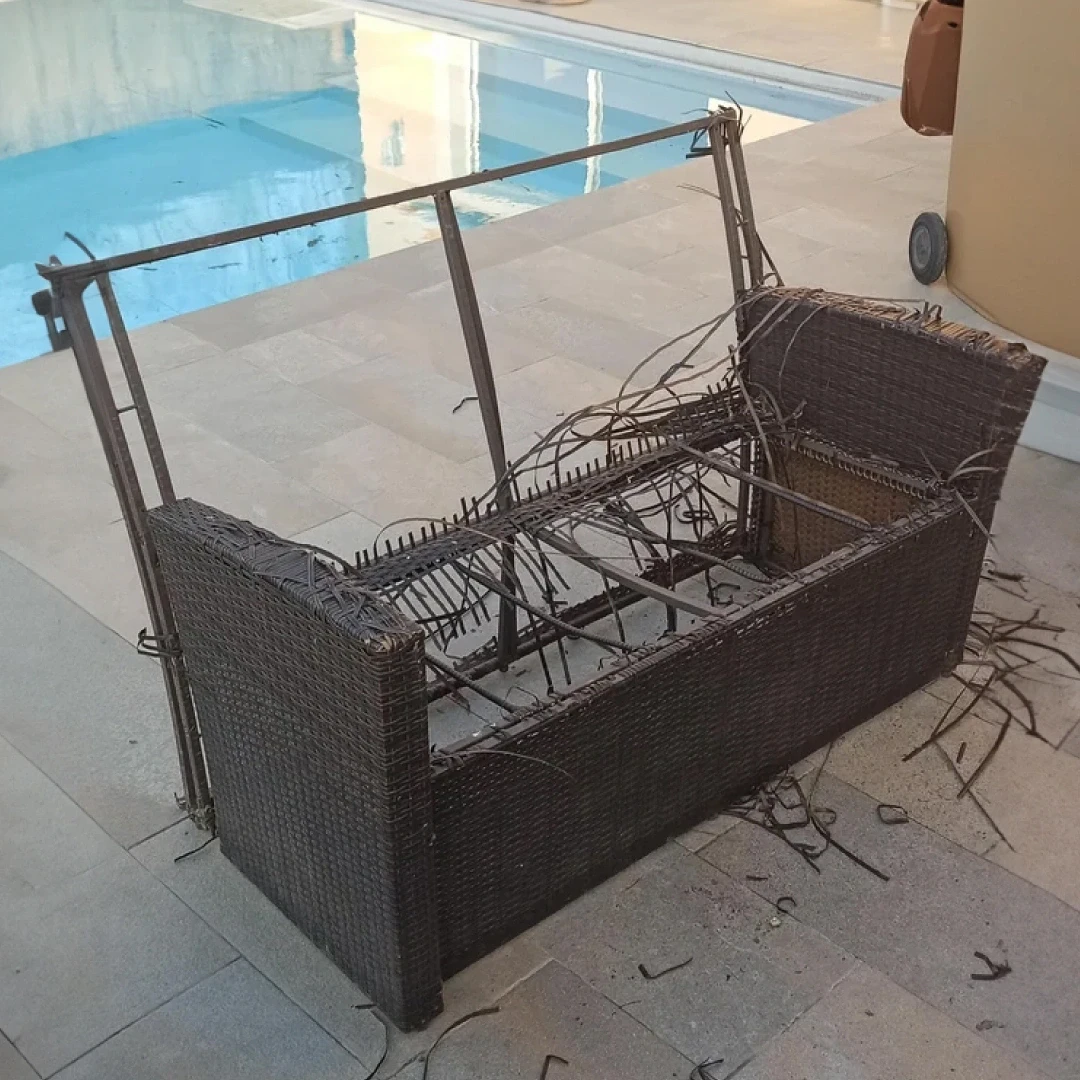 Outdoor sofa damaged by weather