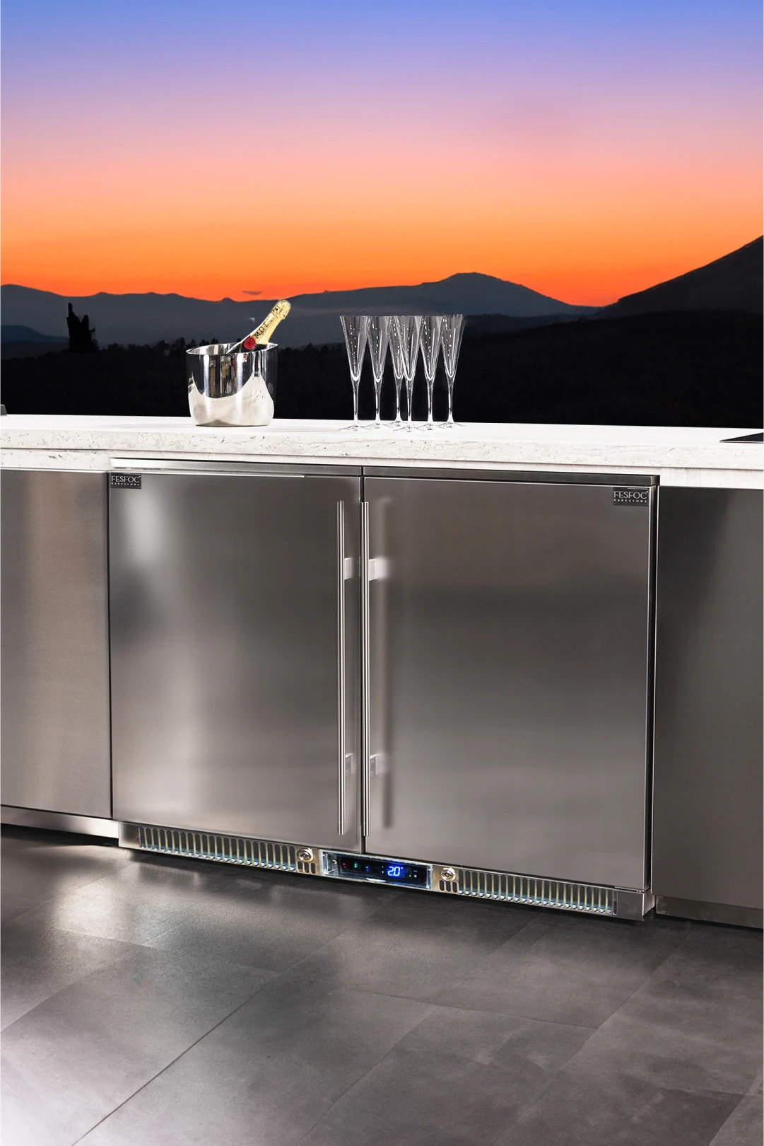 outdoor kitchen with fridge and sink