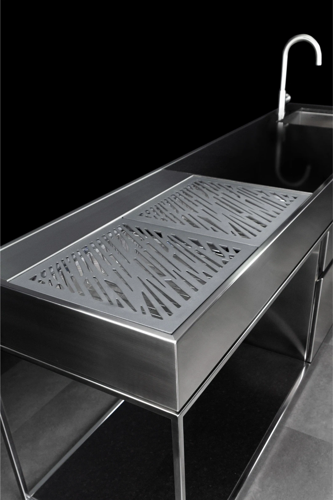 outdoor kitchen with charcoal barbecue